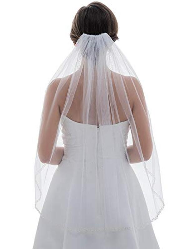 Appréciez notre test détaillé du voilage de mariée Samky 1T ivoire perlée et trouvez le style parfait pour votre grand jour avec élégance et raffinement